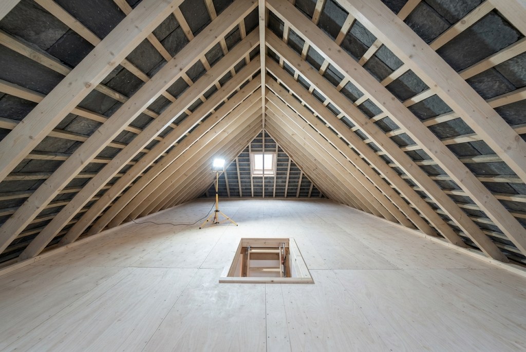 A roof space cleared back to bare timber.